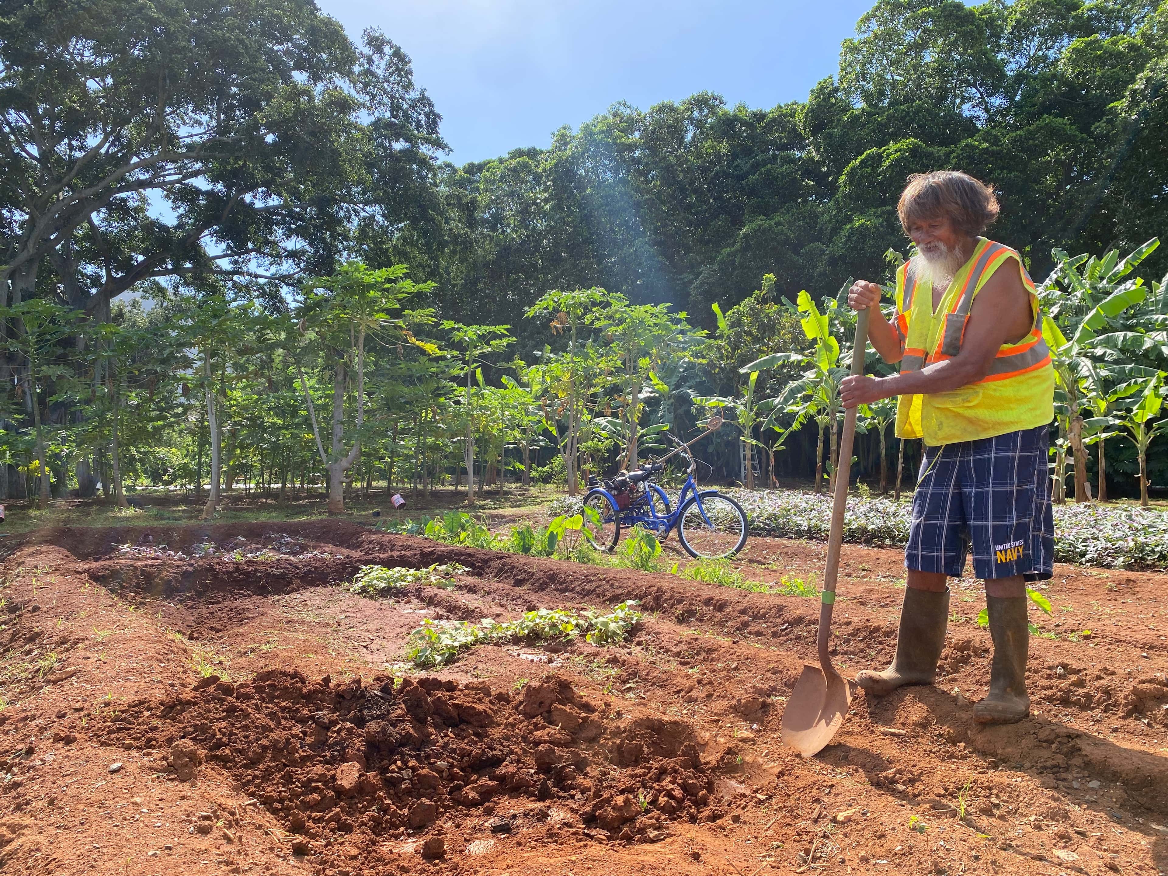 Community member working the land
